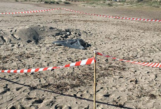 Il cadavere nella busta sulla spiaggia del Poetto