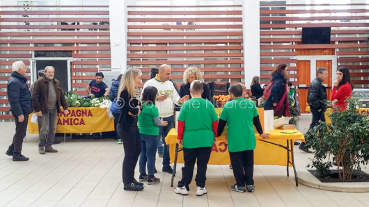 I Ragazzi dell'Isola che non C'è con i responsabili dell'associazione e di Coldiretti (F. S. N). 