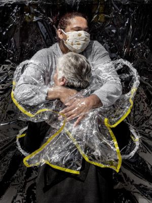 Mads Nissen/Politiken/-Panos Pictures- The First Embrace